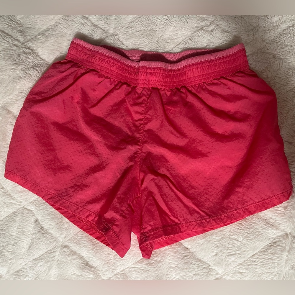 Pink Nike shorts
